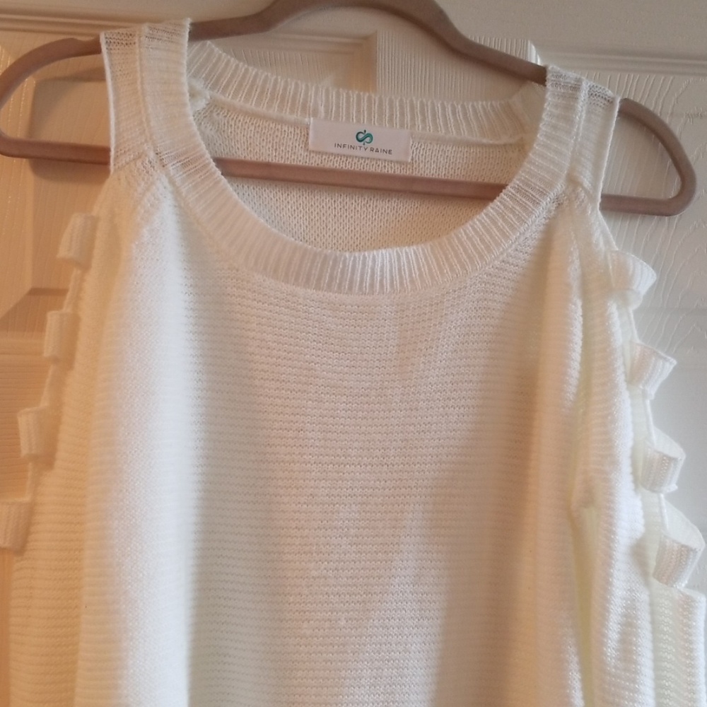 Cold shoulder with cut outs cream sweater